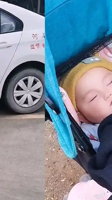 河南一驾校教练帮女学员带娃,孩子安心在旁睡觉,学员认真练车